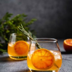 citrus-cocktail-with-rosemary-negroni-with-ice-an-2023-02-16-01-57-06-utc_11zon