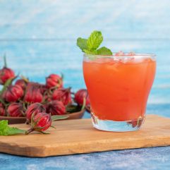 iced-roselle-tea-glass-with-fresh-roselle-fruit-wooden-table-healthy-herbal-drink-concept-herbal-organic-tea-good-healthy_11zon